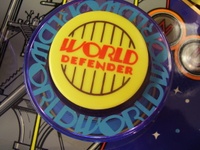 Image # 65542: World Defender Pop Bumper Cap 
(Serial number 6521.)