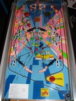 Image # 54288: West Club Playfield 
(The top left round yellow rebound rubber is from Bally. The round yellow rebound rubbers at each outlane are from Williams. These parts are not original to this game.)