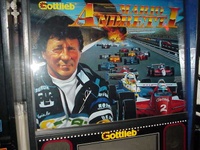 Image # 27046: Mario Andretti Autographed Backglass 
(Autograph located on left lapel.)
