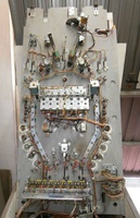 Image # 58045: Tic & Toc Under Playfield 
(Two large coils reset all seven drop targets simultaneously.)