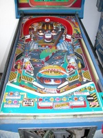 Image # 32952: Lap By Lap Playfield 
(Two of the three pop bumpers have no caps in this image.)