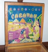 Image # 8404: Camel Caravan Repainted Backglass - Partial Name 
(The words 'Genco's CAMEL-' have been painted over on this glass.)