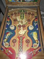 Image # 75419: Canasta Playfield 
(This playfield is missing the two flipper-shaped posts at the very top center of the playfield, above the white post, and where a rubber ring fits around all three of them.)