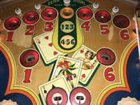 Image # 75425: Canasta Illuminated Upper Playfield 
(This playfield is missing the two flipper-shaped posts at the very top center of the playfield, above the white post, and where a rubber ring fits around all three of them.)