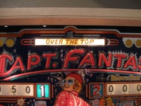 Image # 44264: Capt. Fantastic and The Brown Dirt Cowboy Early Production Backglass (Over The Top, no stars) 
(This is the Over The Top version of the backglass from game serial number 1088, the 88th game produced.)