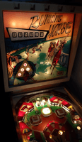 Image # 74343: Running Horse Illuminated Backglass 
(The cabinet has been repainted. The game in the flyer used white rubber rings.)