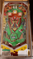 Image # 74345: Running Horse Playfield 
(The slingshot plastics and the center plastic are reproduction. The cabinet and the apron have both been repainted. The game in the flyer used white rubber rings.)