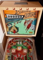Image # 74351: Running Horse Backbox - Top 
(The cabinet has been repainted. The center playfield plastic is reproduction. The game in the flyer used white rubber rings.)