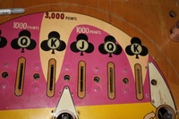 Image # 49339: Card Trix Playfield - Detail 
(Note the 'K lanes use a light beige color as compared to the white colors nearby.)