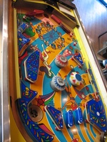 Image # 59677: Carnival Playfield - Downfield View 
(Two of the pop bumper caps do not match the ones shown in the manufacturer's flyer. Serial number 0400.)