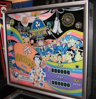 Image # 59737: Mikoshi Backglass 
(The height of this game can be compared to the Williams games next to it. Serial number 4034.)