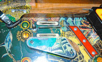 Image # 76608: Shark Illuminated Playfield - Detail 
(The red plastic is not original to this game.)