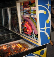 Image # 55542: Close Encounters of the Third Kind Prototype Game - Backbox - Right 
(This game has no serial number. Notice the blue and yellow backbox stripes on its front.)