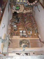 Image # 58255: Close Encounters of the Third Kind Sample Game - Inside Cabinet 
(The unused jack to the right of the Total Play meters is for a chime unit. Serial number 01097 S.)
