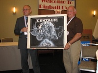 Image # 70443: Centaur Original Backglass Artwork 
(Designer Jim Patla is on the left. Artist Paul Faris is on the right.)