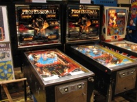 Image # 43046: Professional Pinball: Challenger IV Cabinet - Full View 
(From L to R: Versions IV and V.)