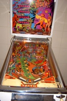 Image # 23650: Sultan Illuminated Front View - Modified Game 
(This game has had two flippers removed and two slingshots installed with plastics from Williams 'Flash'.)