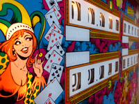 Image # 79700: Joker Poker Sample Game - Illuminated Backglass - Detail 
(Serial number 01044 S.)