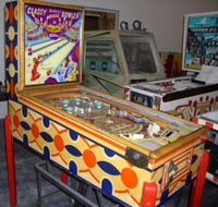 Image # 28274: Classy Bowler Cabinet - Left 
(Gottlieb data does not support that this game was built with wooden legs. The manufacturer's flyer shows metal legs.)