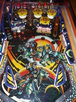Image # 40690: Cosmic Gunfight Orange Version Playfield 
(The owner of this game states he has clearcoated the playfield and applied reproduction drop target stickers.)