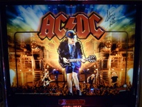 Image # 52341: AC/DC (Let There Be Rock Limited Edition) Illuminated Backglass 
(Signed by the designer. Serial number 234387.)