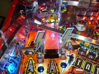 Image # 52345: AC/DC (Let There Be Rock Limited Edition) Upper Left Playfield 
(The playfield has been raised in this image. Serial number 234387.)
