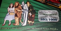 Image # 70358: The Wizard of Oz (Standard Edition) Numbered Sticker 
(This silver numbered sticker was provided for the first 1000 games in the production run. Subsequent games in the run did not have this sticker.)