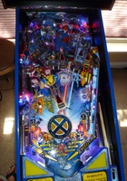 Image # 55817: X-Men Wolverine LE Playfield 
(All playfields are manufactured with the designer's signature below the right flipper. Serial number 235748.)
