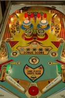 Image # 50837: Cowboy Playfield 
(This game has light shields colored red and green. The flippers on this playfield are reversed, causing the printing to be upside down.)