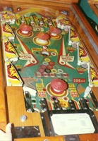 Image # 581: Cue Ball Playfield 
(The white pop bumper platter is not original to this game.)
