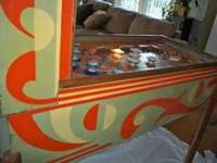 Image # 39868: Cyclone Cabinet - Left 
(The game flyer shows that both flippers are supposed to be white. Serial number 053123C.)