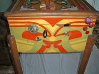 Image # 39869: Cyclone Cabinet - Front 
(The game flyer shows that both flippers are supposed to be white. The oval doorbell button on the coin door is likely a free-play button and is not original to this game.)