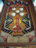 Image # 39865: Cyclone Playfield 
(The game flyer shows that both flippers are supposed to be white. The posts nearest the flippers are not original to this game. Serial number 053123C.)