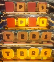 Image # 62977: Cyclopes OPES and TERS Targets 
(Photographs made with and without camera flash are compared here to inform about color. Two drop target stickers are missing. Serial number 5882.)
