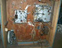 Image # 61924: C.O.D. Inside Backbox 
(Just to the right of the replay unit, a bell assembly is missing. On the stepper unit above that empty space, a second bell is missing, showing only its clapper.)
