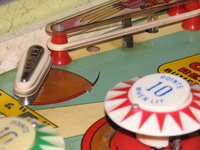 Image # 46378: Alpine Club Left Side Missing Lamp Socket 
(Under the playfield, the flipper end-of-stroke switch required the space where the light socket would be. Serial number 19514.)