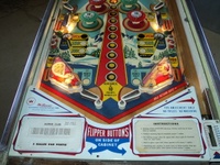 Image # 49930: Alpine Club Illuminated Lower Playfield 
(The two white posts below the flippers were added after the game left the factory. Serial number 22236.)