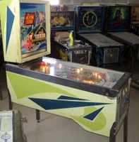 Image # 49931: Alpine Club Cabinet - Left 
(The two white posts below the flippers were added after the game left the factory. Serial number 22236.)