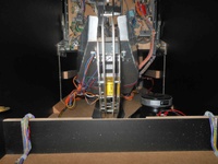 Image # 69418: The Big Lebowski� Pinball (First Model) Bowling Mechanism - Underside 
(This view was photographed through the front doorway.)