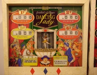 Image # 34722: Dancing Lady Sample Game -  Backglass 
(Besides having multiple colors around the score reels, this glass, and the Sample backbox, were slightly shorter than the production version.)