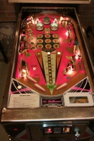 Image # 58476: Dealer's Choice Illuminated Playfield 
(Center rollovers Special is lit. Right lane Special is lit. Same Player Shoots Again is lit.)