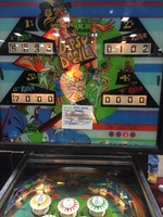 Image # 63063: Dipsy Doodle Early Production Backglass - 4-digit Scores 
(The lower cabinet displays point scoring for a 5-digit scoring game.)