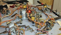 Image # 71944: Dixieland Under Lower Playfield 
(All parts and white labels are original to this game except some plunger lever arms were worn and had to be replaced. Serial number 3232.)