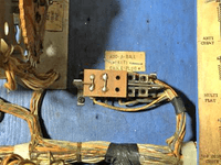 Image # 82798: Dogies Replay Mode Shorting Plug Installed 
(In the wood near the jack, two starter holes can be seen where the optional Add-A-Ball Relay Assembly would be mounted.)