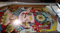 Image # 67915: Dyn O' Mite Playfield - Original Flippers 
(The original flippers have the exposed screw heads and washers.)