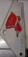 Image # 39419: Eight Ball Playfield Plastic - Reverse 
(Pinky Tuscadero's shirt on this slingshot plastic appears red when the game is on, and tan when the game is off.)
