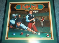 Image # 71150: Eight Ball Champ Original Backglass Artwork 
(Artist is Tony Ramunni.Watercolor on posterboard.Approximate dimensions 24 1/2 inches by 26 inches. Metal frame is 30 1/2 by 32 1/2 inches.)