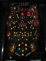 Image # 26049: Eight Ball Champ Illuminated Playfield - Feature Lites On
