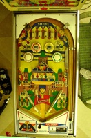 Image # 28847: Elite Guard Playfield 
(The bumper cap point values seen on this game were changed by the operator to account for his modification to 5-digit backglass scoring.)