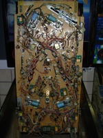Image # 43689: F-14 Tomcat Prototype Game - Under Playfield 
(This game's MPU has prototype ROMs; their white stickers indicate PROTO5. Serial number 554 196508. )